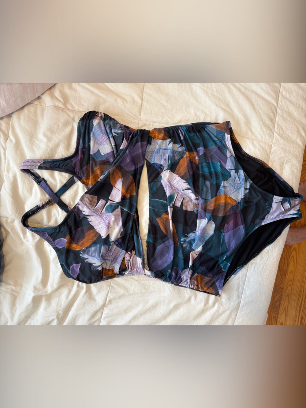 Leaf-Print Black One-Piece Swimsuit with Purple & Teal Accents